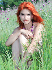 Amidst the wild grass, and delicate lavander flowers, a ravishing Viola showcases her natural beauty with engagingly carefree and uninhibited poses that reminds us of lazy summer afternoons.