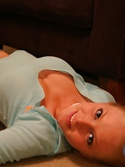 Blonde teen Skye shows off her perfect little body in a lowcut top and jeans