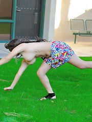 Leila does cartwheels topless outside